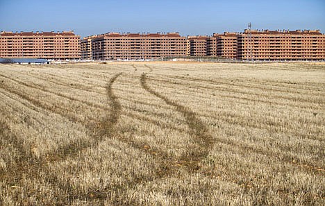 &lt;p&gt;Blocks of unfinished apartments are seen on the outskirts of Madrid Thursday Nov. 25, 2010. Portuguese and Spanish borrowing costs have risen to near record highs as investors worried that the governments' debt loads will prove unsustainable, putting them next in line for a European bailout. Spain's economy remains stuck in the mire of an exploded real estate bubble as it struggles to emerge from nearly two years of recession, and unemployment is at a eurozone high of 19.8 percent.&lt;/p&gt;