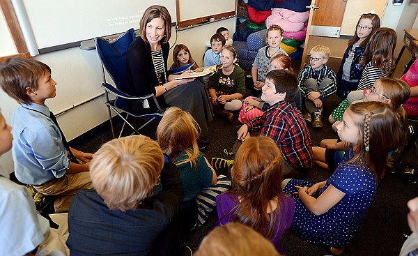 &lt;p&gt;Kate Anderson reads to Valerie Clark&#146;s fourth-grade class on Wednesday at Stillwater Christian School. Every week Clark invites a &#147;mystery reader&#148; into the class. The students are given clues during the week about whom the guest will be.&lt;/p&gt;