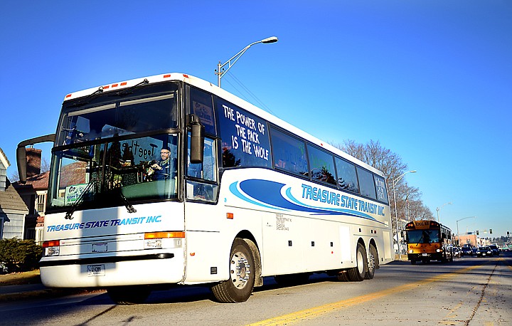 &lt;p&gt;Two buses from Glacier High School get an escort through town from the Kalispell Police and Fire Departments and the Montana Highway Patrol on Friday, November 22. (Brenda Ahearn/Daily Inter Lake)&lt;/p&gt;