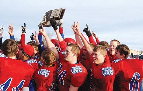 Wibaux Pioneer/Courtesy The Superior Bobcats celebrate their win in Wibaux Saturday. The Bobcats beat the Longhorns 28-21 after trailing 6-21 going into the fourth quarter.