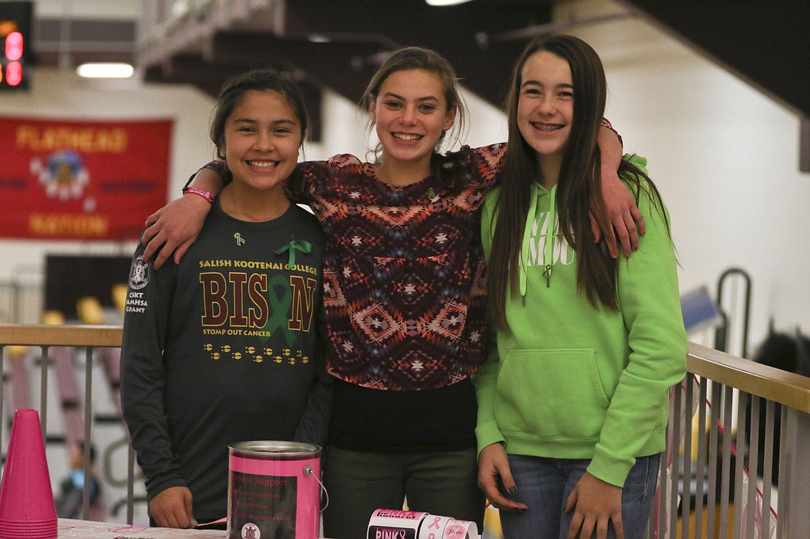 &lt;p&gt;Alana Earthboy, Maggi Lake, and Madeline McCrea pose while helping out at one of the booths during SKC's cancer awarness night during Founder's week.&lt;/p&gt;