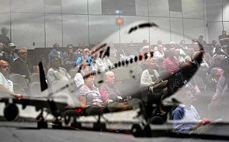 &lt;p&gt;An image of a plane hangs on the wall as airport chaplains are reflected during a presentation at the International Association of Civil Aviation Chaplains' annual conference at Delta Air Lines' headquarters, on Sept. 20 20in Atlanta.&lt;/p&gt;