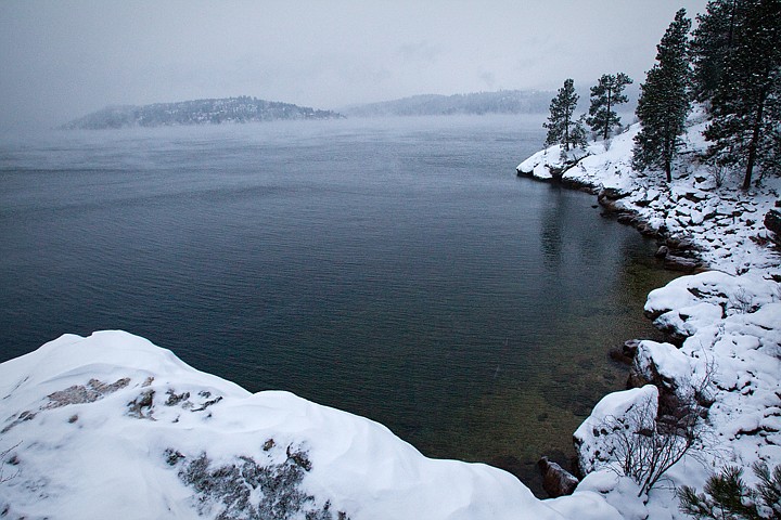 &lt;p&gt;SHAWN GUST/Press The south shores of Tubbs Hill provide a wintery contrast against the darkened waters of Lake Coeur d'Alene as dusk falls.&lt;/p&gt;
