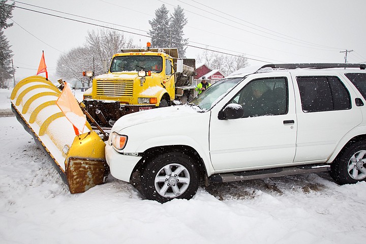 &lt;p&gt;SHAWN GUST/Press An Idaho Transportation Department snow plow truck partially blocks traffic Monday after it collided with a vehicle at the intersection of 3rd Street and East Annie Avenue in Coeur d'Alene. The two vehicles were traveling southbound on 3rd Street when the driver of the snow plow attempted to make a left-hand turn, striking the SUV. No injuries and minor damage were reported.&lt;/p&gt;