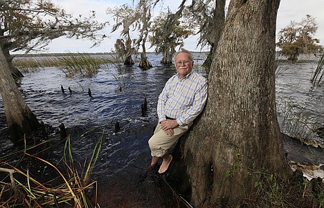 &lt;p&gt;Charles Lee, director of advocacy with Audubon of Florida, poses in the wetland area of Kissimmee, Fla., which straddles the headwaters of the Everglades ecosystem, on Nov. 18. Conservation programs and environmental regulations have been pared back significantly in many states that have grappled with budget deficits in recent years. Florida Gov. Rick Scott's first budget included his veto of a $500,000 water quality study on Lake Okeechobee and some $20 million in cuts to Everglades' restoration.&lt;/p&gt;