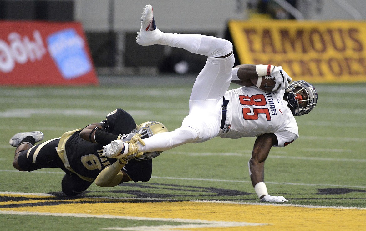 &lt;p&gt;South Alabama's Maaseiah Francis (85) can't break the shoestring tackle by Idaho's Armond Hawkins (8) during the first quarter of an NCAA college football game Saturday, Nov. 26, 2016, in Moscow, Idaho. (Kyle Mills/Lewiston Tribune via AP)&lt;/p&gt;