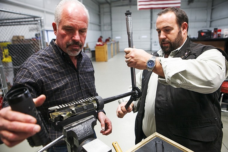 &lt;p&gt;Kirk Leopold, left, and Clint Walker assemble a short-barreled AR-15 Tuesday afternoon at Nemo Arms.&lt;/p&gt;