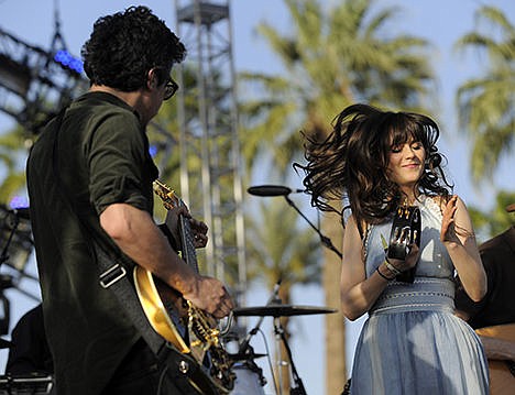 &lt;p&gt;M. Ward, left, and Zooey Deschanel of the band She &amp; Him perform during the first day of the Coachella Valley Music and Arts Festival in Indio, Calif., April 16, 2010. The musicians convened a 20-piece orchestra to make &quot;Classics,&quot; a collection of songs written between 1930 and 1974. The new album releases Dec. 2.&#160;&lt;/p&gt;