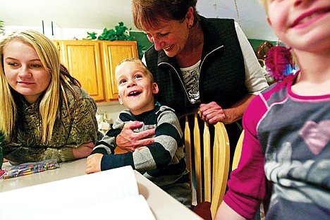 &lt;p&gt;Karen Frejlach, 61, spends time with her grandchildren Brooke Bircher, 14, Carter Dixon, 3 and Olivia Dixon, 8, Thursday, Oct. 25 at her Coeur d'Alene home. Frejlach underwent cancer treatments from January 2009 to June 2010. During that time she followed a healthy diet which she still maintains in order to maximize her time with her family.&lt;/p&gt;