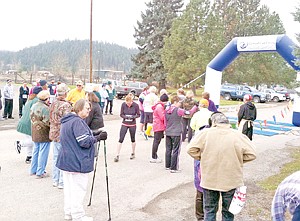 &lt;p&gt;Runners and walkers mill around before the gun signals the start of the Turkey Dash 5K next to City Hall. There were 58 participants.&lt;/p&gt;