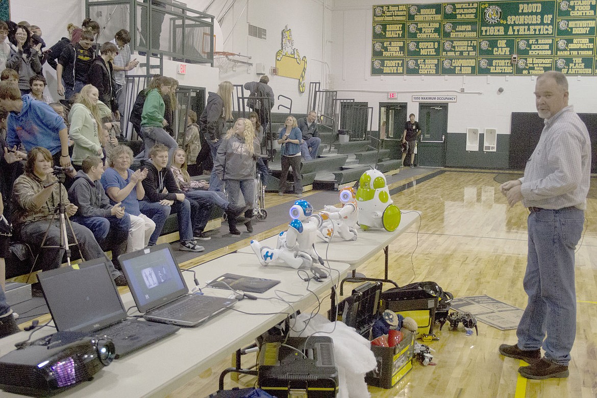 &lt;p&gt;Hunter Lloyd, far right, performs his robotic comedy routine with a message for the St. Regis schools last week.&lt;/p&gt;