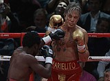 Rourke, 62, wins boxing exhibition bout