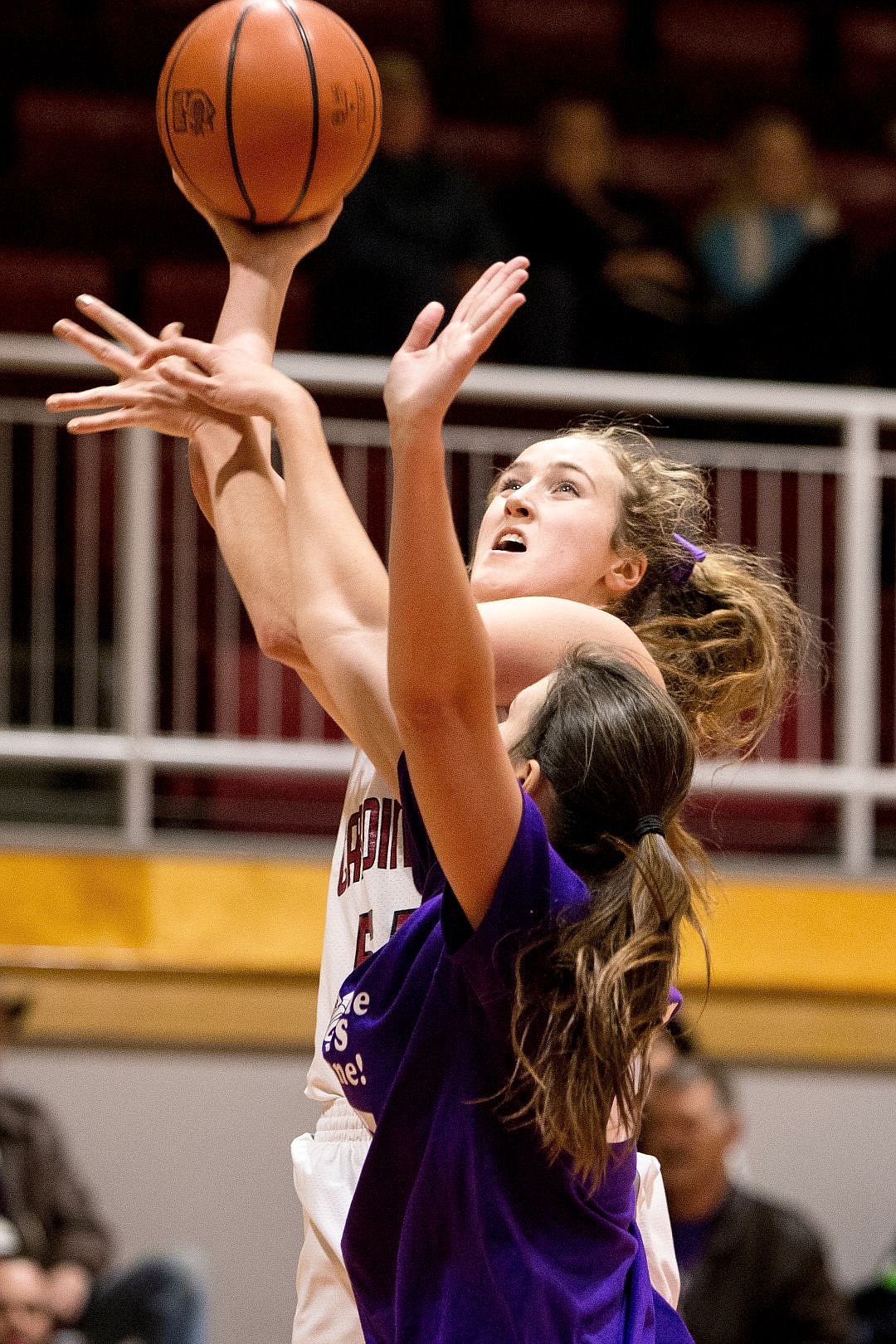 <p>JAKE PARRISH/Press North Idaho College's Charity Marlatt shoots past North Idaho All-Star Sabrina Earle on Saturday at North Idaho College.</p>