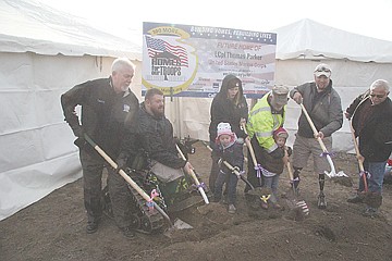 &lt;p&gt;From left to right, Larry Gill, Tomy Parker, Olivia Parker, Amanda Hout, Rick Jennison, Eva Parker, Neil Frustaglio and Bill Barron toss shovelfuls of dirt at Saturday's groundbreaking ceremony.&lt;/p&gt;