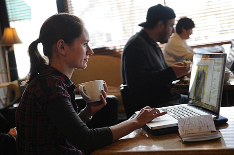 &lt;p&gt;Megan Roney shops online at Europa Coffeehouse in Denver Monday on what has become know as Cyber Monday. Online sales on Cyber Monday, which was started in 2005 by a retail trade group to encourage Americans to shop online on the Monday after Thanksgiving, were up mid-afternoon by 15 percent from a year ago, according to data from IBM Benchmark.&lt;/p&gt;