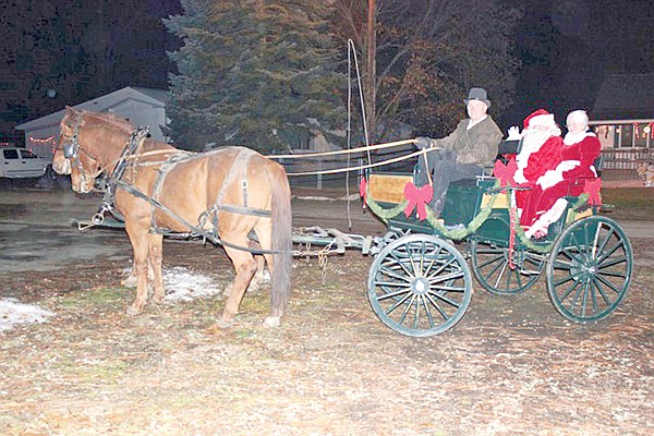 &lt;p&gt;Cecil McDougall brought Mr. and Mrs. Claus to the event at
Troy&#146;s tree-lighting.&lt;/p&gt;