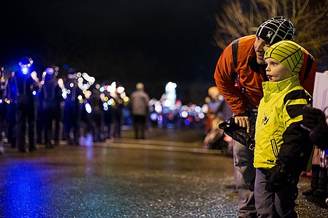 &lt;p&gt;Colby McLean and his son Ryder, 4, enjoy the parade participants passing by on Sherman Avenue.&lt;/p&gt;