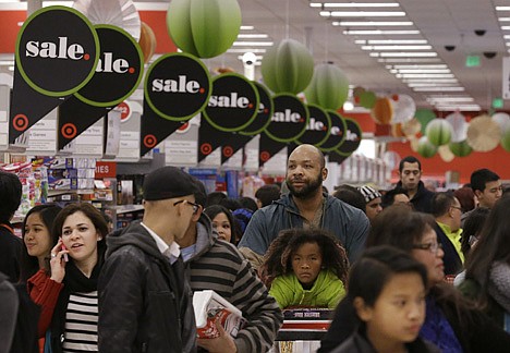 &lt;p&gt;People shop at a Target store in Colma, Calif., Thursday.&lt;/p&gt;