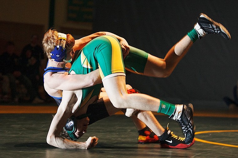 &lt;p&gt;Patrick Cote/Daily Inter Lake Columbia Falls sophomore Colton Gove (left) takes down Whitefish's Judah Prestegaard Friday night during Whitefish's home matchup against Columbia Falls. Friday, Nov. 30, 2012 in Kalispell, Montana.&lt;/p&gt;