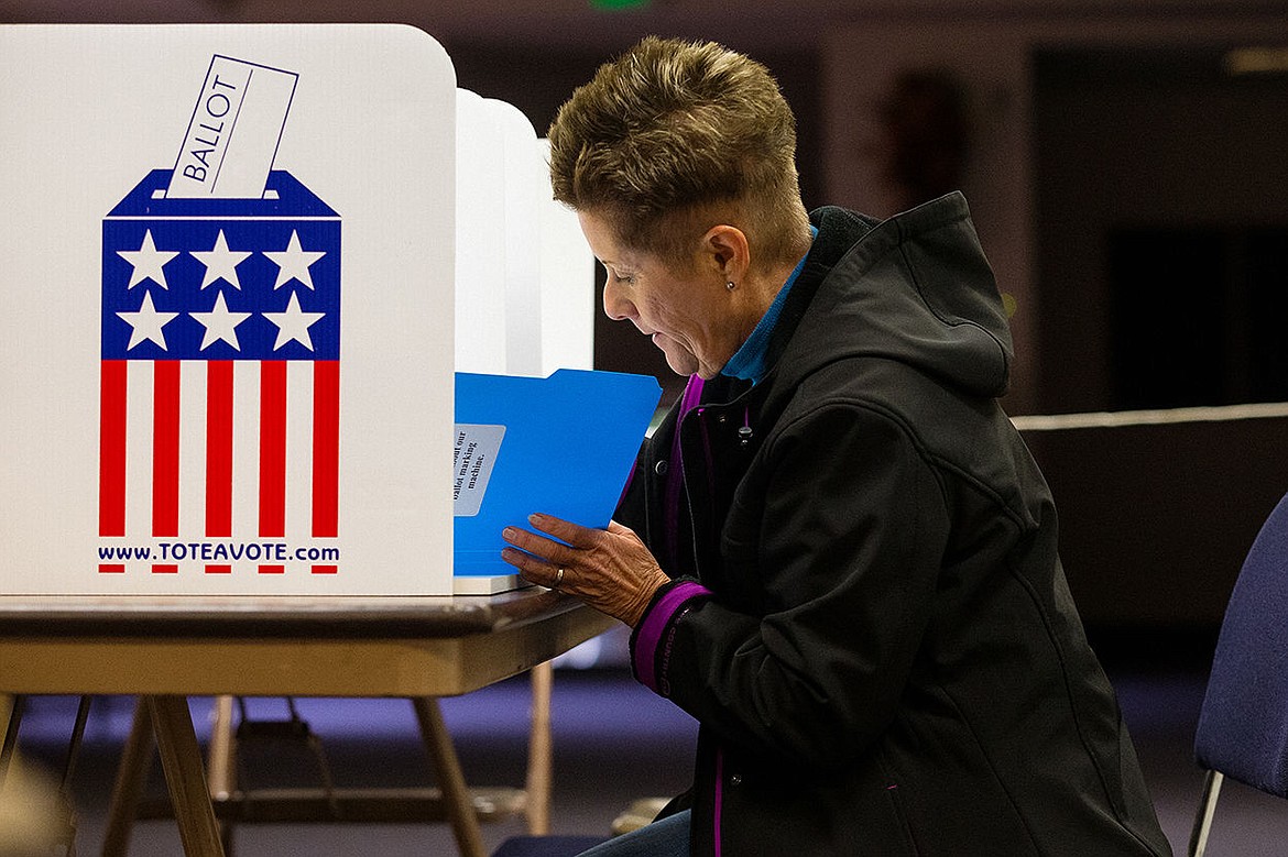 &lt;p&gt;Jane Thomas casts her vote in the city council race at precinct 47, the Church of the Nazarene, on Tuesday in Coeur d&#146;Alene.&lt;/p&gt;