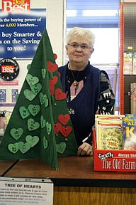 Margaret X at Gambles shows her holiday cheer and helps local childrean at the same time with a Tree of Hearts.