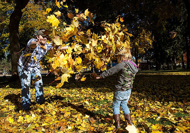 &lt;p&gt;TESS FREEMAN/Press&lt;/p&gt;&lt;p&gt;Chris Gross of Rathdrum throws leaves for his daughter Haley Gross, 3, at city park in Coeur d&#146;Alene on Friday afternoon. &#147;This is really the only place where there's all these nice leaves to play in,&#148; Gross said. &#160;&lt;/p&gt;