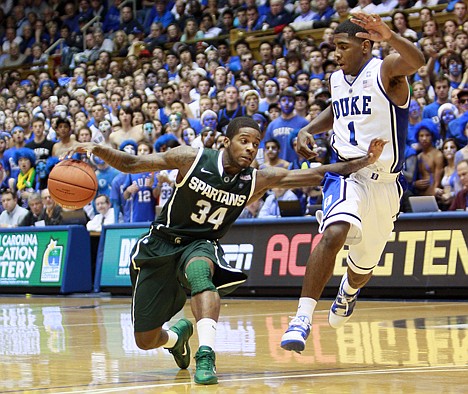 &lt;p&gt;Duke's Kyrie Irving (1) guards Michigan State's Korie Lucious (34) during the second half Wednesday in Durham, N.C.&lt;/p&gt;