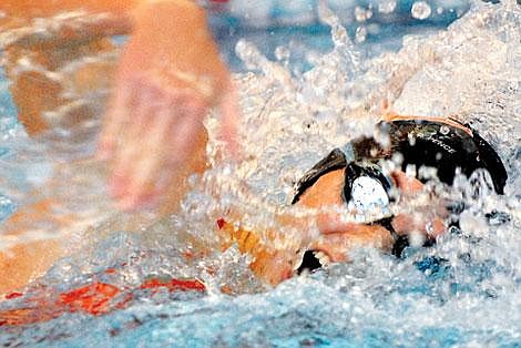 Flathead High School senior Allison Grubb competes in the girls&#146; 100 freestyle finals during the Flathead Invitational at The Summit on Saturday. Grubb, who swam a personal best time, said, &#147;It&#146;s kind of amazing because it&#146;s the first meet of the year. So I&#146;m pretty happy right now.&#148; Garrett Cheen/Daily Inter Lake