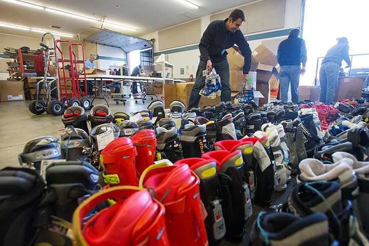 &lt;p&gt;SHAWN GUST/Press Brent Eacret, of the Alpine Shop in Sandpoint, lines up an inventory of boots Thursday while setting up for the Winter Swap 2013 at the Kootenai County Fairgrounds in Coeur d&#146;Alene. Public equipment check in is today from 3:00 p.m. until 8:00 p.m. Doors open to the public to shop the event, sponsored by the Silver Mountain ski patrol, open Saturday at 9:00 a.m.&lt;/p&gt;