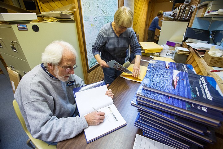 &lt;p&gt;SHAWN GUST/Press Stephen Shepperd, author of &#147;Hydromania: A History of the Diamond Cup,&#148; signed pre-ordered copies of the book about hydroplane racing on Lake Coeur d&#146;Alene as volunteer Kathy Hennigan prepares the books for mailing Wednesday at the Museum of North Idaho. 2,000 total books were printed and are available at other local bookstores as well as the museum&#146;s website, http://www.museumni.org/books_hydromania.html.&lt;/p&gt;