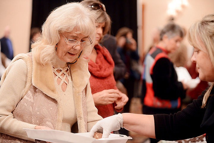 &lt;p&gt;Linda Agather of Kalispell picks out chocolate treats at the Flathead County Republican Women&#146;s 30th Annual Chocolate Extravaganza on Wednesday at the Hilton Garden Inn in Kalispell. The event had a sellout crowd of 480 people.&lt;/p&gt;