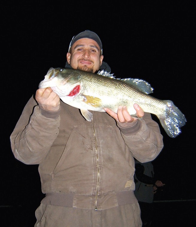 Corino Gonzales, of Othello, shows a nice bass caught and
released on a swim jig.