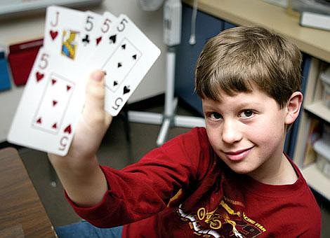 Nicholas Ferrell, 11, a fourth-grader at Peterson Elementary, was dealt three fives, one jack, and one queen. He discarded the queen and, after the dealer cut the deck, a five of hearts was the starter, matching his jack &#151; giving Ferrell a perfect hand of 29 points. Craig Moore/Daily Inter Lake