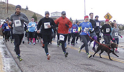 <p>These four runners and the dog are in lock step just after the start of the race.</p>