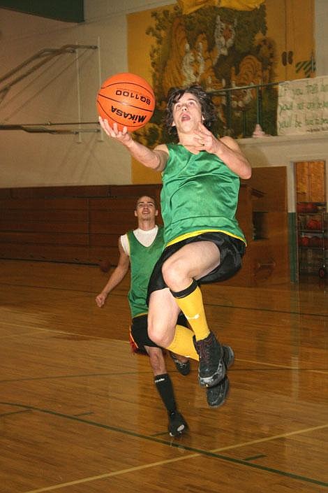 Nick Ianniello/Mineral Independent St. Regis Tiger Willy Roper gets some air going for a basket during practice Wednesday afternoon. The Tigers are gearing up for their first game against Hot Springs Dec. 9.