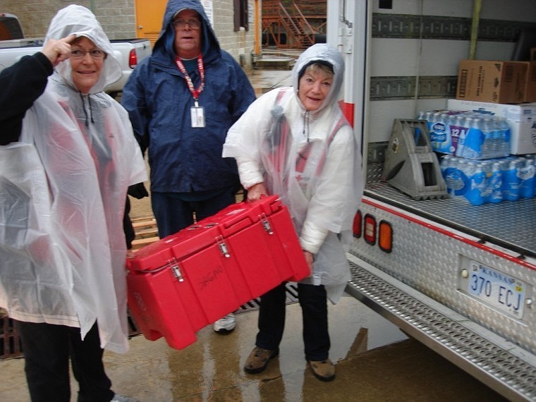 <p class="p1">From right, Flathead Valley residents Margie and John Donoghue and another Red Cross volunteer load an insulated chest filled with hot food to take to Superstorm Sandy victims on the New Jersey shore. Both 80, the Donoghues served 17 days performing post-storm relief.</p>