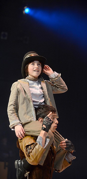 <p>Jane Trina as Oliver rides the shoulders of Mikey Winn as The Artful Dodger at the dress rehearsal of "Oliver!" on Monday, December 2, in Whitefish. The opens tonight with a sneak performance at 7:30 for S10. The official opening is Friday, December 6. "Oliver!" will run for three weekends. (Brenda Ahearn/Daily Inter Lake)</p>