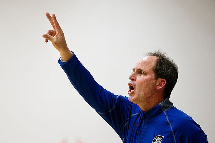 &lt;p&gt;Coeur d'Alene boys' basketball head coach Kurt Lundblad calls out a play to his team during the last minute of a match-up against Shadle Park on Thursday at Coeur d'Alene High School. The Vikings defeated the Highlanders 45-44.&lt;/p&gt;