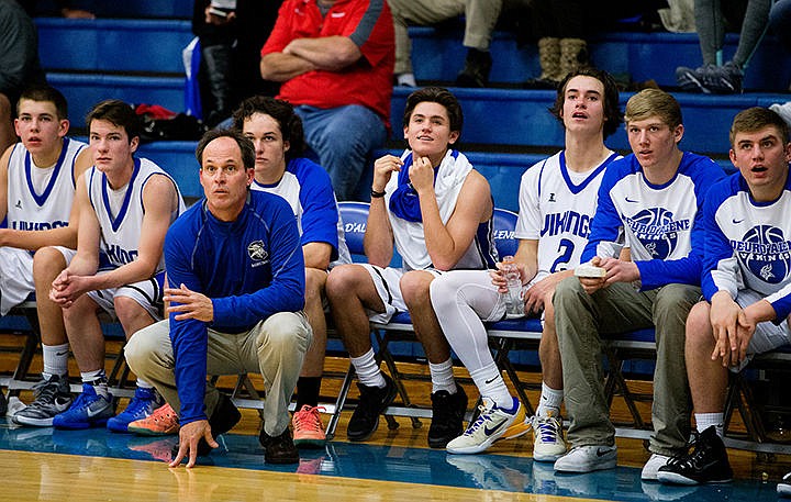 &lt;p&gt;Coeur d'Alene head coach Kurt Lundblad and his team watch as teammate Sam Matheson shoots free throws in the final seconds of a nail-biting match-up against Shadle Park on Thursday at Coeur d'Alene High School. The Vikings defeated the Highlanders 45-44.&lt;/p&gt;