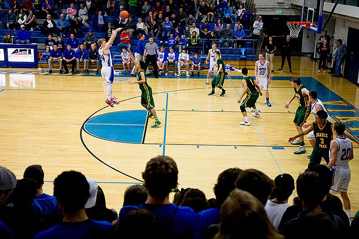 &lt;p&gt;Coeur d'Alene's Joey Naccarato takes a jumpshot during a match-up against Shadle Park on Thursday at Coeur d'Alene High School. The Vikings defeated the Highlanders 45-44.&lt;/p&gt;