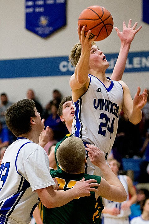 &lt;p&gt;Coeur d'Alene's Joey Naccarato goes up for a lay-up at a face-off against Shadle Park on Thursday at Coeur d'Alene High School. The Vikings defeated the Highlanders 45-44.&lt;/p&gt;
