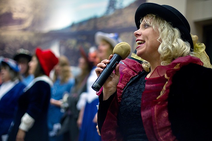 &lt;p&gt;Bianca Dixon, with The Majestic Mountain Chorus, sings Christmas songs with the group in the city hall rotunda during the Winterfest celebration.&lt;/p&gt;