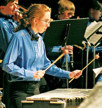 Mattie Casey, a senior at Libby High School, performs with the LHS Jazz Band Tuesday night during their holiday concert at the Memorial Center. Casey holds many honors with the LHS band, including percussionist section leader and band officer.