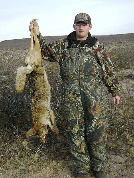 &lt;p&gt;This January 2014 photo provided by Curtis Wright shows Wright holding up a coyote he shot during a prize hunt near California City, California.&lt;/p&gt;