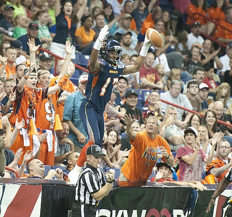 &lt;p&gt;Spokane Shock wide receiver Adron Tennell celebrates a big play by jumping on the boards at the Spokane Arena during a game last season.&lt;/p&gt;