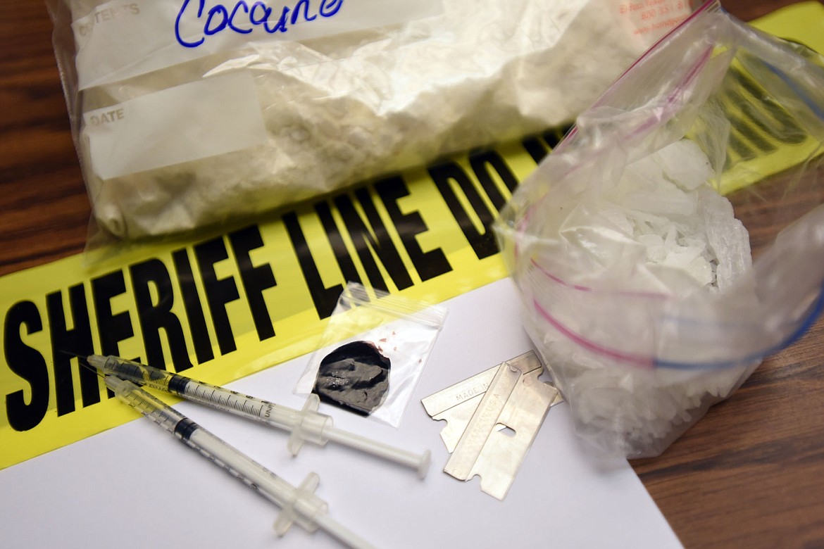 &lt;p&gt;&lt;strong&gt;A collection&lt;/strong&gt; of items in evidence at the Flathead County Sheriff's Office on Tuesday, December 1, in Kalispell. Seen here are; half a kilo of cocaine, valued at $15,000, 4 oz of methamphetamine valued at $12,000, and 1.3 grams of Heroin valued at just under $200. (Brenda Ahearn/Daily Inter Lake)&lt;/p&gt;