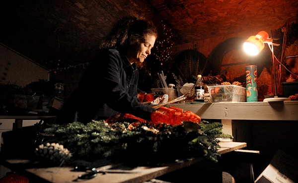 &lt;p&gt;Marilyn Brady works on decorating a Christmas wreath on Monday
morning at Snow Line Tree Company. Brady has been decorating for
Snow Line for 15 years.&lt;/p&gt;