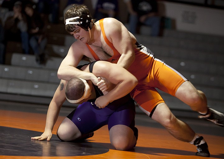 &lt;p&gt;Patrick Cote/Daily Inter Lake Conner Hagel, right, works to turn
Butte's Dylan Wine in the 215-pound weight class during Flathead's
match against Butte Friday afternoon.&lt;/p&gt;