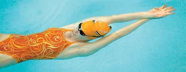 Karen Nichols/Daily Inter Lake&lt;br&gt;Flathead's Elizabeth Myers glides underwater at the onset of the 50-yard backstroke race Saturday. The photo of Myers appears distorted since she was completely underwater while being photographed. She placed fourth in the event at the Flathead Invitational at The Summit.