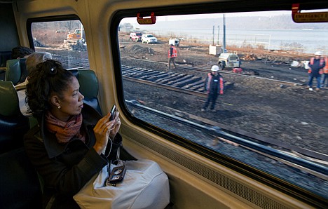 &lt;p&gt;Passengers on a Metro-North train view ongoing repair work near the Spuyten Duyvil station in the Bronx borough of New York Wednesday, where a fatal derailment disrupted service on the Hudson Line of the railroad Sunday, Dec. 1. The line was running at ninety eight percent capacity today, according to Metro-North.&lt;/p&gt;